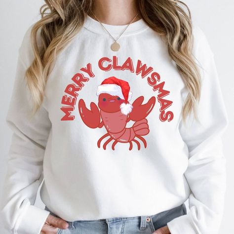 This awesome Cajun Christmas shirt is the ultimate holiday season outfit to wear during the entire winter season. The fun eye catching design of this Louisiana Christmas shirt makes it the perfect Cajun Christmas sweatshirt for every occasion during the holidays. This Ugly Xmas sweater will be an amazing Christmas present for you and everyone you know in your circle of friends and acquaintances. This Merry Clawsmas Crawfish sweatshirt is sure to be a show stopper and a conversation starter. Cajun Christmas, Louisiana Christmas, Crawfish Shirt, Ugly Xmas Sweater, Circle Of Friends, Xmas Sweater, Baby T Shirts, Youth Hoodies, Soft Textiles