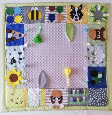 A custom designed tummy time play mat with farm elements Diy Sensory Play Mat, Tummy Time Blanket Diy Play Mats, Tummy Time Quilt Pattern, Sew Play Mat, Tummy Time Play Mat, Diy Tummy Time Mat, Baby Play Mat Diy Sewing, Play Mat Diy, Quilted Play Mat