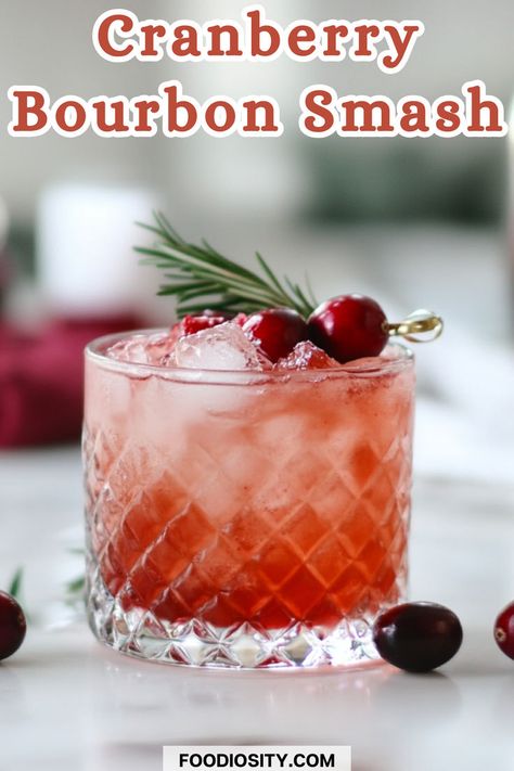 Looking for a cocktail with bold flavors and seasonal flair? This Cranberry Bourbon Smash combines the tartness of cranberries with the richness of bourbon, creating the perfect drink for fall or holiday gatherings. Whether you're hosting a party or enjoying a cozy night in, this cocktail is a must-try. Click to get the easy recipe and add a festive twist to your drink menu! Whiskey Drinks Simple, Cranberry Syrup, Whiskey Smash, Festive Holiday Cocktails, Bourbon Smash, Cocktail Recipes Whiskey, Fall Cocktail, Cocktail Syrups, Cozy Drinks