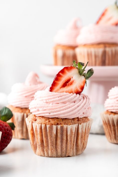 These vegan strawberry cupcakes are soft, fluffy, filled with fresh strawberries and topped with a naturally pink strawberry buttercream. Vegan Strawberry Cupcakes, Strawberry Cupcake, Strawberry Buttercream, Vegan Cupcakes, Strawberry Cupcakes, Pink Strawberry, Fresh Strawberries, Fresh Strawberry, Vegan Food