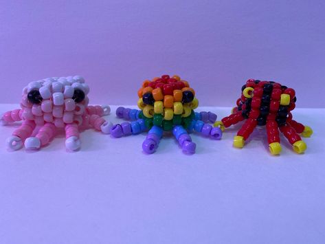 Custom Kandi octopus  2.25 inches tall (including legs) design you want! Made to order  I will check with you to see if you like the octopus as it is being made Kandi Octopus, Kidcore Fashion, Can Tab Crafts, Kandy, Rave Girl, Pony Bead Crafts, Diy Kandi, Kandi Kid, Kandi Cuff