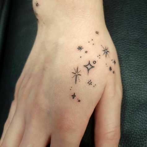 Moon And Star Hand Tattoo, Stars On Hands Tattoo, Saltburn Tattoo Ideas, Filler Tattoo Ideas Gap Stars, Tattoo Star Filler, Small Scattered Tattoos, Stars Tattoo On Hand, Hand Stars Tattoo, Saltburn Tattoo