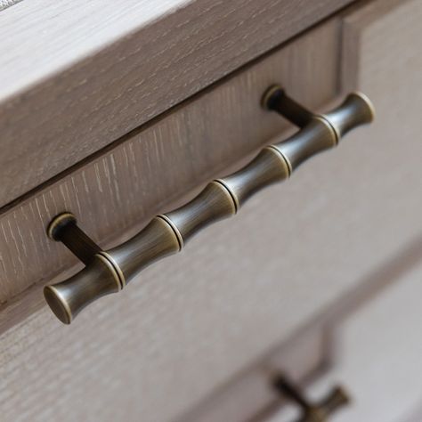 Embrace the natural beauty of bamboo and dress your joinery with the Grove Cabinet Handle, a bamboo-inspired cabinet handle from our Grove collection, designed in collaboration with Sophie Paterson. Echoing one of nature’s most iconic forms, the textured brass cabinet handle is defined by its elegant linear bamboo silhouette and distinctly tactile feel to elevate timeless interior settings. Sustainably made from 100% solid brass Hand-finished Available in four sizes Fixings included Available in Bamboo Silhouette, Bamboo Cabinet, Lodge Bedroom, Sophie Paterson, Armac Martin, Bamboo Cabinets, Brass Cabinet Handles, Brass Cabinet Hardware, Joinery Details