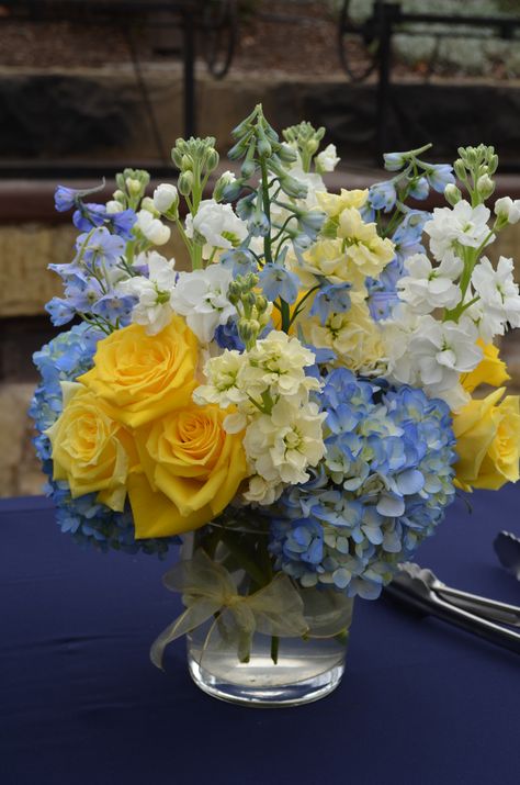 Blue & yellow centerpice Yellow Flower Centerpieces, Yellow Flower Arrangements, Yellow Centerpieces, Blue Flower Arrangements, Lemon Themed Bridal Shower, Yellow And Blue Flowers, Blue Centerpieces, White Flower Arrangements, Yellow Wedding