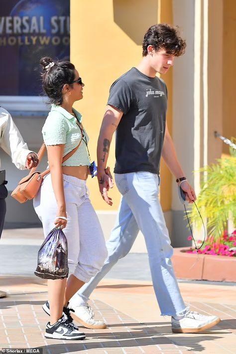 Camila Cabello showcases curves in a crop top after celebrating second anniversary with Shawn Mendes | Daily Mail Online Shawn Mendes And Camila Cabello, Crop Top Men, Universal Studios Outfit, Second Anniversary, Power Couple, Men Summer, Sweet Couple, Shawn Mendes, Celebrity Couples