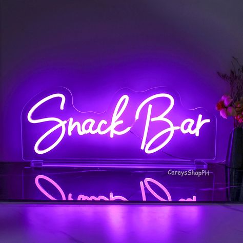 "Snacks Bar" This neon sign conveys a love of relaxed and casual food culture, emphasizing the importance of enjoying snacks while socializing and entertaining. It encourages people to find joy in everyday life and enjoy good food and good times. Such a neon sign can create a relaxed and enjoyable atmosphere that appeals to people who love snacking and socializing. It can also be a cultural symbol that inspires people to enjoy good food and company in their lives. Processing Time: The neon sign will be crafted and ready for shipment within the next 5-7 business days. Shipping Time: Once shipped, it typically takes 8-15 days for the neon sign to reach you, regardless of your location in the world. Package Contents: Your Neon Sign 1*Dimmer  1 Set Mounting Screws 1*Power Supply/Adapter Materi Room Led Lights, Bar Mitzvah Decorations, Bar Led Lights, Bar Neon Sign, Hope Design, Shop Decor, Shop Light, Light Sign, Find Joy