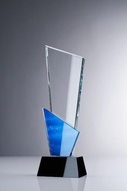 Crystal trophy against gray background | Premium Photo #Freepik #photo #award-plaque #glass-award #acrylic-trophy #glass-trophy Glass Awards Trophy, Award Collection, Glass Trophy, Brand Identity Colors, Crystal Trophy, Celebrate Success, Glass Trophies, Acrylic Trophy, Award Trophy