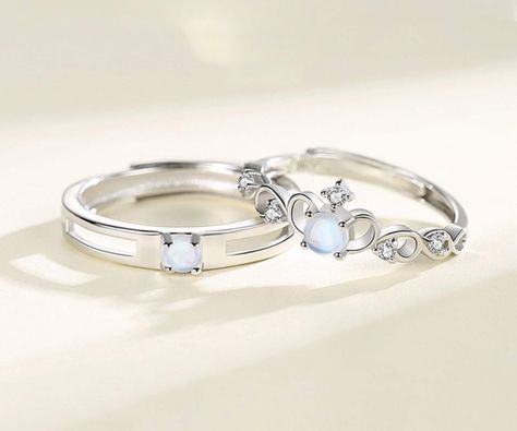 "Welcome to our new Collection 2023 for Valentine Couple Ring \"Fall in Love 2023\". We offer multiple designs for couple matching rings. ♡ Couple Silver Moonstone Hollow Crown Ring, Trend Jewelry Gift, Couple Ring, Adjustable Matching Promise Ring ♡ Rings are made of S925 high quality silver plated, fashion and durable ♡ Each pair of rings is unique design and well - made and inspired from a love story behind ♡ Come with a box and ready to gift your beloved ones ♡ Size: Resizable from US 5 to US 10 (If you are in special size, please send us message for custom request) ----- DELIVERY NOTE ----- ♡ All items are made-to-order and need 3 - 5 business days to finish and ready to sending out ♡ Delivery within US: 2 - 4 weeks and rest of the world takes 3 - 5 weeks. You might receive it earlier Couple Ring Design Silver, Couple Matching Rings, Hollow Crown, Matching Promise Rings, Valentine Couple, Couple Ring Design, Silver Promise Rings, Fall Rings, Valentines Couple