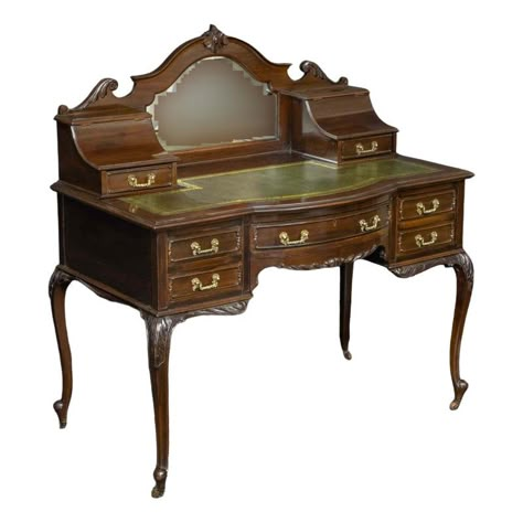 A very attractive ladies writing desk from the late Victorian period. Made from solid mahogany and very much in the Rocco style. Sat on cabriole legs with carved shoulder and apron, slightly bowed to the central drawer and with matching storage slopes to the writing surface. To the recessed back there is a mirror. Victorian Writing Desk, Antique Room Decor, Victorian Style Furniture, Dark Wood Desk, Victorian Vanity, Ladies Writing Desk, Antique Writing Desk, Brown Desk, Retro Desk