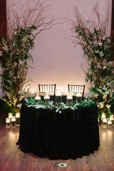 Forest Green Black And Silver Wedding, Green And Black Dessert Table, Dark Sweetheart Table Wedding, Emerald Green And Black Wedding Reception, Black Wedding Head Table, Sweetheart Table Wedding Emerald Green, Sweetheart Table Black Tablecloth, Black Wedding Arbor, Black And Emerald Wedding Decorations