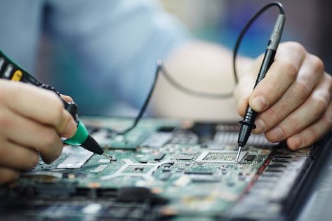 Checking current in laptop circuit board | Free Photo #Freepik #freephoto #laptop-service #laptop-repair #computer-maintenance #computer-technician Computer Repair Shop, Computer Maintenance, Macbook Repair, Computer Problems, Washing Machine Repair, Computer Repair Services, Ac Repair Services, Appliance Repair Service, Pc Repair