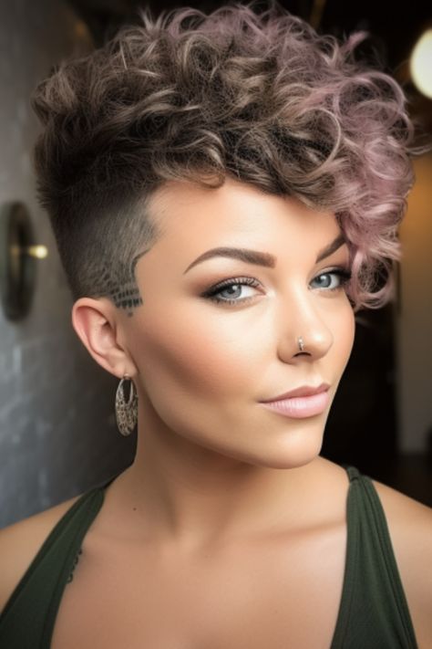 The Shaved Hair style trend's popularity is driven by its edgy and bold look, seen as attractive and a symbol of self-confidence. Half Shaved Hair Short Curly, Curly Half Shaved Hair, Short Curly Side Shave, Short Curly Faux Hawk, Very Short Permed Hair, Short Curly Undercut Women, Permed Mohawk, Women Undercut Hairstyles, Hairstyles For Very Short Curly Hair