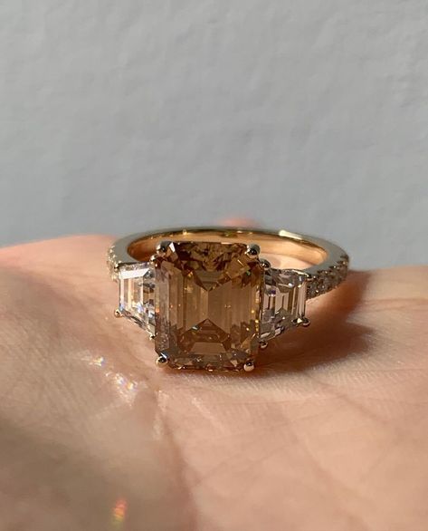 3 CT Brown Emerald Cut And Side Shield Cut Three Stone 10K 14K 18K Solid White Yellow and Rose Gold 925 Sterling Silver Engagement Three Stone Ring R I N G M E T A L ✥ Metal : 10K 14K 18K Solid White Yellow and Rose Gold, 925 Sterling Silver ✥ Metal Clarity : 100% Pure ✥ Stamp/Hallmark : Yes. Will be Indicated Inside The Ring M A I N S T O N E S ✥ Type : Moissanite Diamond ✥ Diamond Shape : Emerald Brilliant Cut Diamond ✥ Diamond Weight : 3 CT ✥ Diamond Color : Brown ✥ Side Diamond Shape ; Shield Brilliant Cut Diamond ✥ Side Diamond Weight : 1.25 Carat ✥ Side Diamond Color : White ✥ Clarity : VVS1 VVS1 ✥ Diamond Cut : Excellence R I N G S I Z E S ✥ All Ring Size are Available ✥ Free Sizing ✥ If You Have any Questions With Regards to Sizing Please Contact as ✥ Please Send me a Message If Yo Brown Diamond Ring, Ring Three Stone, Future Engagement Rings, Three Stone Ring, Dear Future, Rose Gold Engagement, Stone Engagement Rings, Brown Diamond, Gift Ring