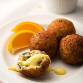 salt cod fritter with saffron aioli on the plate Cod Fritters Recipe, Macanese Food, Fishball Recipe, Cod Fritters, Aioli Recipe, Fritters Recipe, Shellfish Recipes, Cod Recipes, Fritter Recipes