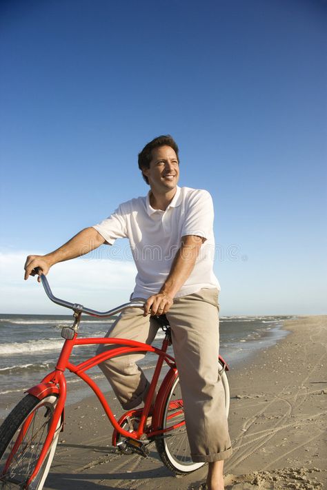 Man riding red bicycle on beach. Caucasian mid-adult man posing on bicycle on be , #ad, #bicycle, #beach, #red, #Man, #riding #ad Bicycle Reference, Bicycle Photography, Red Bicycle, Man Posing, Beach Red, Beach Bicycle, Red Bike, Typography Poster Design, Male Poses