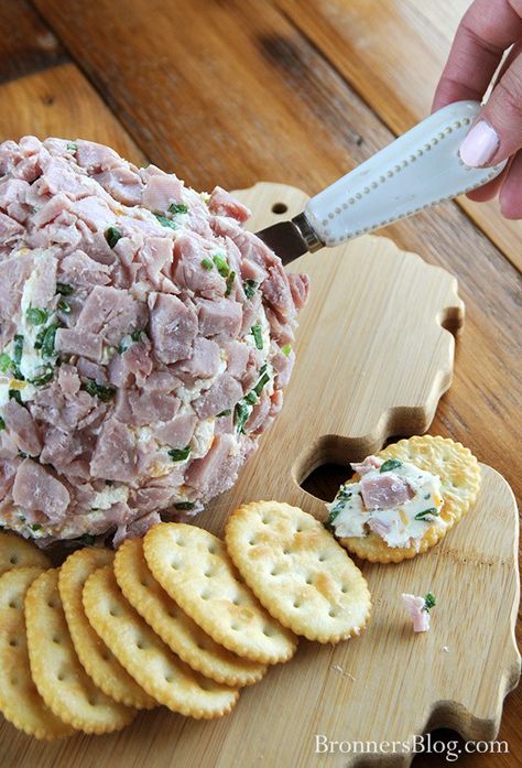 Ham Cheese Ball Recipe  Ingredients:  2 (8-oz.) pkg. cream cheese (room temperature) 1 pkg. Hidden Valley Ranch dressing  2 c. shredded cheddar cheese and 1 green onion, chopped – ham, chopped.  Instructions: 1. Mix together the cream cheese, dressing packet, and shredded cheese. 2. Form into a ball.* 3. Cover completely with the chopped green onion and ham.  Recipe Note: Wrap in plastic wrap and chill first to shape the ball more easily Ham And Onion Cheeseball, Ham And Green Onion Cheese Ball, Ham And Cream Cheese Ball, Ham Balls Recipe Cream Cheeses, Ham Cheese Ball Recipes, Ham And Cheese Ball, Ham Cheese Ball, Ham And Cheese Ball Recipe, Ham Balls