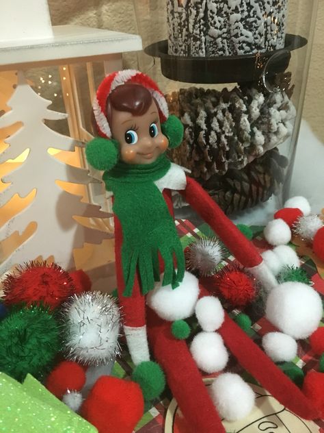 Ear muffs and a scarf. Elf On The Shelf Ear Muffs, Wlf On The Shelf, Elf Ears, Ear Muffs, Elf Ideas, Shelf Ideas, Earmuffs, On The Shelf, Christmas Elf