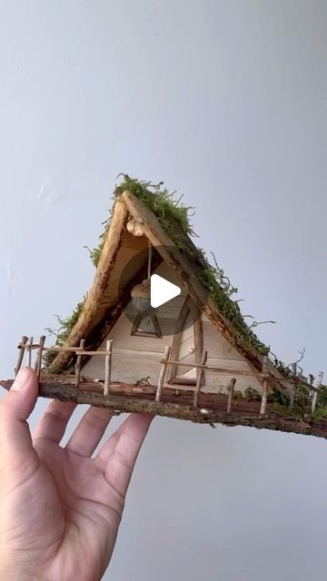 Maryinthefairyland on Instagram: "Fairy treehouse - built with natural materials. Full DIY video tutorial on my YouTube channel: https://youtu.be/IH3BNWs4lJU Materials used: craft sticks, branches, bark, moss, wood glue, hemp string You will find the craft sticks I used here: https://a.co/d/39I13kE & https://a.co/d/dgBJjns (Paid link) #fairytreehouse #fairyland #fairyvillage #fairyforest #whimsicalworld #enchantedforest #enchantedhouses #fairyhouse #fairyhouses #fairydwellings #fairytales #feenhaus #gnomehouse #gnomehome #pixiehouse #pixiehollow #pixiedwellings #hobbithouse #diyfairyhouse #wichtelhaus #miniatureart #naturecraft #naturecrafts #fairymagic" Diy Fairy Garden House Ideas, Diy Fairy Tree House, Garden Fairy Houses Diy, A Frame Fairy House, Homemade Fairy Houses Diy, Driftwood Fairy House, Diy Fairy Home, Nature Materials Craft, Fairy Tree Houses Diy