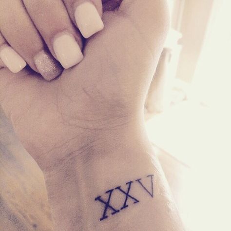 would totally get this exact thing exact location. XXV=25 which is my high school basketball jersey number 25 Roman Numeral Tattoo, Roman Numeral 5 Tattoo, Roman Numeral 6, Roman Numeral 5, 5 Tattoo, Roman Numeral Tattoo, Tattoo On Wrist, Numeral Tattoo, Roman Numeral Tattoos