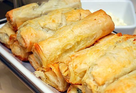 One of my absolute favorite Greek dishes is spanakopita, which is a mixture of spinach, onions, cottage cheese and feta cheese wrapped with ... English Recipes, Pasta Fillo, Cheese Wrap, Food Matters, Phyllo Dough, Greek Dishes, Greek Recipes, Finger Food, Cottage Cheese