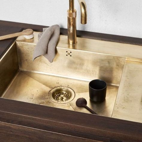 The kitchen sink: one of the most utilitarian objects in any home. Unless, of course. it’s brass. The gold-coloured credentials of this wonderful metal add instant richness to a room, whatever the style. Modern and minimalist, timeless and traditional – all benefit from the addition of a little brass. Scroll through these sumptuous examples and […] Brass Kitchen Sink, Metal Sink, Vintage Style Kitchen, Brass Kitchen, Kitchen Sinks, Kitchen Pantry, Kitchen Styling, Interior Design Kitchen, Interior Design Inspiration