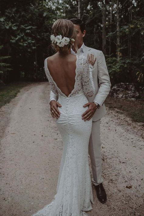 Sexy Wedding Dresses: 30 Racy Designs For Daring Brides - hitched.co.uk Wedding Dresses Simple Lace Boho, Cut Out Back Wedding Dress, Elegant Wedding Dress Fit And Flare, Lacey Boho Wedding Dress, Wedding Dresses Long Sleeve Mermaid, Fitted Bridal Dress, Wedding Dresses Sleek Elegant, Tight Wedding Dresses With Sleeves, Tighter Wedding Dress