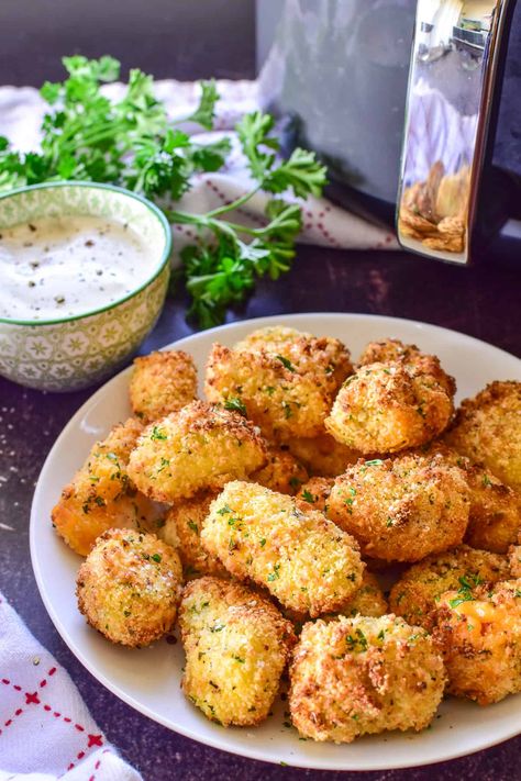 Say hello to your favorite new snack... Air Fryer Cheese Curds! Perfectly crispy on the outside, gooey on the inside, and packed with delicious cheese flavor, they're everything you want in fried cheese curds... without all the oil! Air Fryer Cheese Curds, Cheese Curds Recipe, Air Fryer Snacks, Air Fryer Cheese, Cheese Curd, Fried Snacks, Fried Cheese Curds, Recipes To Try At Home, Seasoned Bread Crumbs