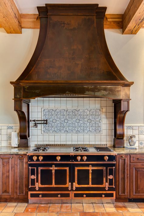 Cherry Hills Range Hood in the Classic Collection | Raw Urth Designs, CO Rustic Hood Vents Kitchen, Custom Hood Vent, Patina Kitchen, Corbels Kitchen, Kitchen Hood Ideas, Hood Vents, Spanish Style Kitchen, Kitchen Hood Design, Old World Kitchens