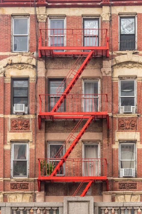 Red fire escape of an apartment building in New York city Apartment Fire Escape, Escape Tattoo, Nyc Fire Escape, New York City Images, Exterior Stairs, New York City Apartment, Fire Escape, New York Apartment, Random House