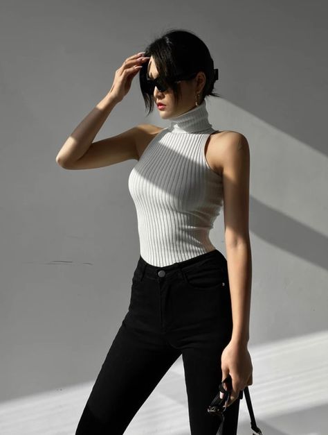 Tank Turtleneck Outfit, White High Neck Tank Top Outfit, Turtle Neck Sleeveless Top Outfit, Tank Top Turtle Neck Outfit, Outfits With White Turtle Neck, Sleeveless Tee Outfit, Turtle Neck Tank Top Outfit, Sleeveless Shirt Outfit, Sleeveless Turtleneck Outfit