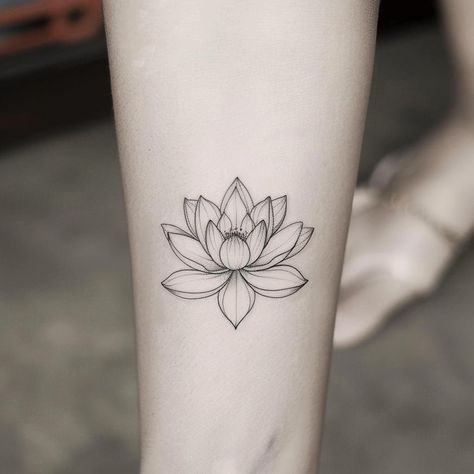 Discover the allure of a freshly inked lotus tattoo, symbolizing purity and rebirth, gracefully adorning a forearm. Let this meaningful art inspire you. Save & follow for more ink inspiration. In this close-up, each petal unfolds with depth, crafted with stunning detail, inviting a sense of inner peace and renewal. 🌸✨ #TattooArt #LotusTattoo #InkInspiration #BodyArt #SpiritualSymbol #AIimage Negative Space Lotus Tattoo, Lotus Flower Tattoo Aesthetic, Forearm Lotus Tattoo, Buddhist Lotus Tattoo, Symbol Of Rebirth, Lotus Flower Tattoo On Neck, Abstract Lotus Tattoo, Lotus Tattoo Neck, Lutos Tattoo Design