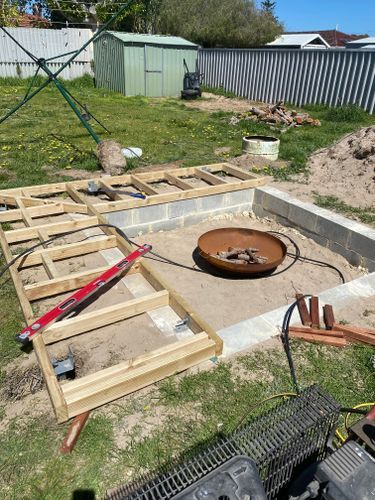 D.I.Y. sunken fire pit with seating | Bunnings Workshop community Sunken Fire Pit With Seating, Fire Pit Sunken, Fire Pit With Seating, Sunken Fire Pit, Fire Pit Sphere, Sunken Patio, Sunken Fire Pits, Conversation Pit, Decking Boards