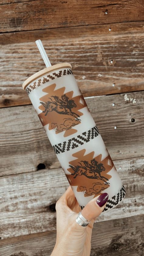 Buckin' Aztec Tumbler -- a tumbler for every cowpoke on the go. Bamboo topper with straw hole. 25 oz. Please Hand Wash Western Boutique Ideas Products, Country Tumbler Cups, Western Tumbler Ideas, Cricut Tumbler Ideas Vinyls, Hydration Aesthetic, Western Cups, Sublimation Tumbler Ideas, Western Gift Ideas, Aztec Tumbler