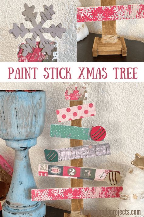 Tis’ the Season to get crafty with this gorgeous Paint Stick Christmas Tree! Grab some coordinating vintage Holiday patterned scrapbook paper, some 1 gallon paint sticks from your local Home Depot, and your trusty glue gun, and make this easy and adorable piece of DIY Christmas decor! #christmasdecor #christmascrafts #diychristmas Paint Sticks Projects, Stick Christmas Tree, Paint Sticks, Diy Christmas Decor, Craft Planner, Christmas Tree Painting, Craft Stash, Pine Cone Crafts, Painted Sticks