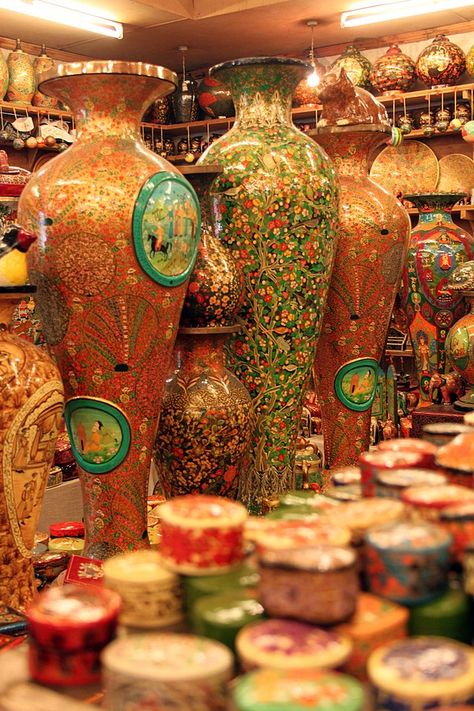 While the mention of Kashmiri Papier Mache conjures images of a diverse range of intricately patterned articles today, it originally gained popularity under its Persian name, Kar-I-Qalamdan, during its nascent stage. The term Kar-I-Qalamdan holds significant h Papier Mache Art, Spice Image, Online Shopping Apps, Beautiful Whatsapp Dp Images, Shopping Apps, Mache Art, Painted Trunk, Woolen Clothes, Lost Paradise