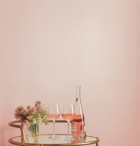 12 Paint Colors That Will Make You Happier, According to Paint Pros | Looking for a paint color with a bit more personality? You'll love this blush pink pick, called Rosé Season, that is a warm pink shade that evokes a sense of optimism and adds a joyful, happy feeling to any room. #paintcolors #realsimple #paintideas #paintcolorideas #bestpaintcolors #homeinspiration Rose Gold Wall Paint, Wall Painting Colors, Gold Painted Walls, Armoire Design, Office Paint Colors, Pink Paint Colors, Best Interior Paint, Rose Gold Painting, Wall Interior