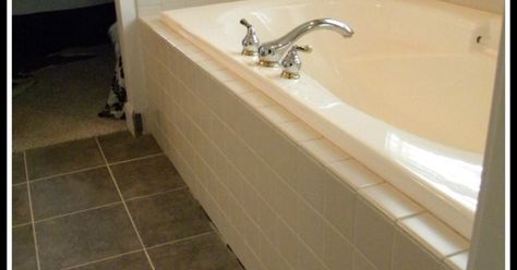 We wanted to give our outdated bathtub a fresh new look without breaking the bank. After giving it some thought, we decided to leave the existing tile in place,… Update Garden Tub Master Bath, Garden Tub Update, Shiplap Around Tub, Update 90s House, Garden Tub Makeover, Garden Tub Remodel, Garden Tub Decor, Garden Tubs, Painted Staircase