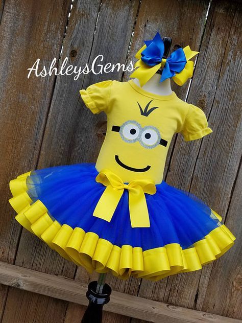 ♡♡♡This tutu is made to order. Current production time for this item is located under the shipping tab. The tutu is made with yards and yards of yellow satin ribbon sewn onto blue tulle. This tutu has two layers of tulle to provide full coverage as well as a full and fluffy tutu! The Minion Tutu, Minion Face, Girl Minion, Little Monster Birthday, Minion Costumes, Ribbon Tutu, Halloween Scavenger Hunt, Minion Birthday Party, Blue Tutu