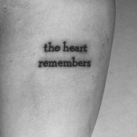 “The heart remembers” tattoo on forearm. IG: @alonnatroche, serif font tattoo Heart Text Tattoo, Lost Love Tattoo For Men, Tattoo For Ex Lovers, Short Poem Tattoo, Tattoo About Unrequited Love, Tatoos About Heartbreak, Nothing Loved Is Ever Lost Tattoo, Break Free Tattoo, Break Up Tattoos For Women