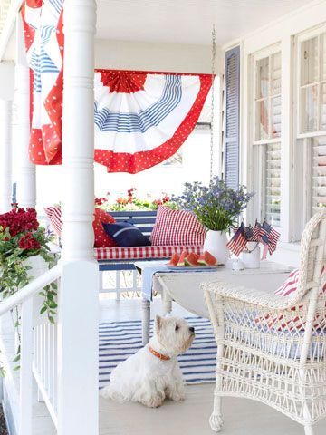 I love this porch - so inviting (I'd take the pup too!)  @Better Homes and Gardens   Oh! This is my porch. Porch Bunting, Patriotic Picnic, Sitting On The Porch, Patriotic Porch, Summer Porch, Diy Outdoor Decor, Front Porch Decorating, 4th Of July Decorations, Patriotic Holidays