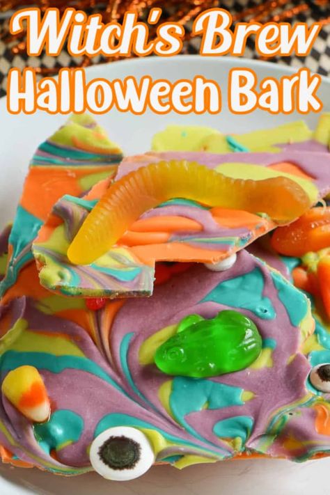 Witch's Brew Halloween Bark Halloween Brew, Halloween Bark, No Bake Cherry Cheesecake, Halloween Witches Brew, Candy Eyeballs, Candy Bark, Halloween Party Snacks, Gummy Worms, Witch's Brew