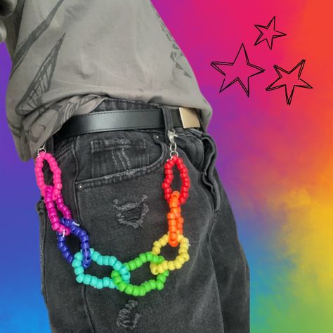 kandi belt chain ! -made with plastic pony beads and white elastic -has two silver metal lobster clasps on each end  -i can do any pride flag so if you have a specific one in mind, feel free to send me a message! :3 Kandi Waist Chain, Clay Bead Bracelet Ideas Pride, Kandi Dragon, Kandi Animals Tutorial, Kandi How To, Kandi Handcuff, Kandi Lanyard, Kandi Rotating Cuff Ideas, Kandi Star Ideas