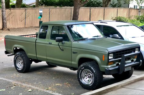 Resto/Mod 4x4 Ranger, 2” body lift, 31x10.5R15, Custom Olive Drab Green and Black. 1986 Ford Ranger, Old Ford Ranger, Ford Ranger Custom, Ford Ranger 4x4, Ford F150 Custom, Ranger Ford, Ranger 4x4, Peugeot 504, Custom Lifted Trucks