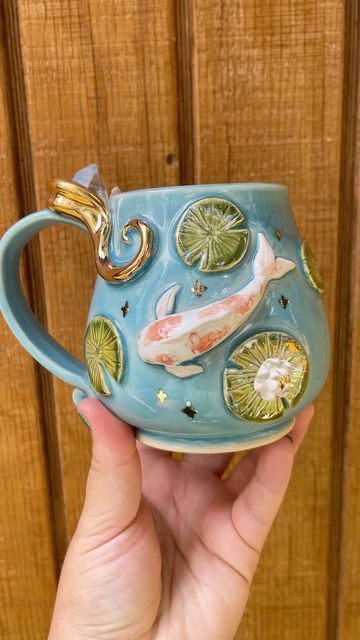 Lauren Lewis on Instagram: "Anyone else wanna jump in? 🐠🐠🐠 . . . #clay #maker #artvideos #artofinstagram #clayart #ceramics #clay #claysculpture #koi #koipond #natureart #natureinspired #lilypad #cottagecore #boho #handmadeceramics #crystals #crystallove" Lauren Lewis, Jesus Art Drawing, Pottery Painting Designs, Pretty Mugs, Clay Mugs, Jewelry Accessories Ideas, Pottery Crafts, Ceramics Ideas Pottery, Art Clay