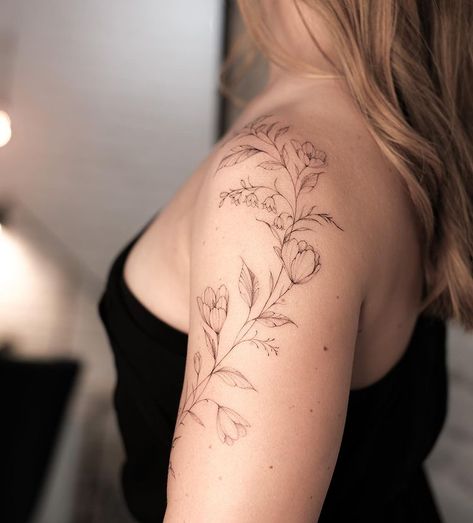 Tereza Emingrová on Instagram: "I am so in love with this placement and the flow 🖤🌿 crocus and lily of the valley for Sara-Jane from Germany. Thank you so much for coming!" Valley Lily Tattoo, Lily Of The Valley Shoulder Tattoo, Lily Of The Valley Tattoo Arm, August Gladiolus Tattoo, Lily Tattoo On Shoulder, Lily If The Valley Tattoo, Dainty Sleeve Tattoos For Women, Crocus Tattoo, Alstroemeria Tattoo