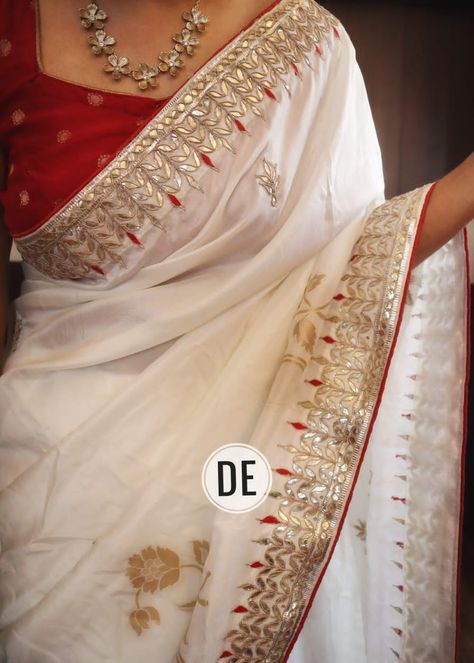 An exclusive wedding attire 💕💕 Very high on demand *Pure munga silk saree in zari floral weaves with heavy gotapatti handwork borders* Hand embroidered gota patti work through Pp 7500/- #dfeminineshoppeestore DM for orders!!!!!!!. Dr Neeta sharma -8827366281 Gotapatti Work Saree, Gotapatti Saree, Munga Silk Saree, Saree Pins, Saree Styling, Gota Patti Work, Lehenga Dupatta, Gotta Patti, Gota Work