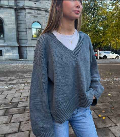 Crochet V Neck Jumper, Low V Neck Sweater Outfit, Layer V Neck Sweater, V Neck Grey Sweater Outfit, Outfits Knit Sweater, Wide Arm Sweater, Styling A V Neck Sweater, Cream V Neck Sweater Outfit, How To Make An Oversized Sweater Fit