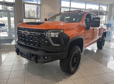 Rare Tangier Orange 2024 Chevy Silverado HD ZR2 Up For Sale In Pennsylvania 2024 Chevy Silverado, Unique Paint Colors, Orange Color Code, Chevy Silverado Hd, Lifted Silverado, Chevy Duramax, Goodyear Wrangler, Silverado Hd, New Paint Colors