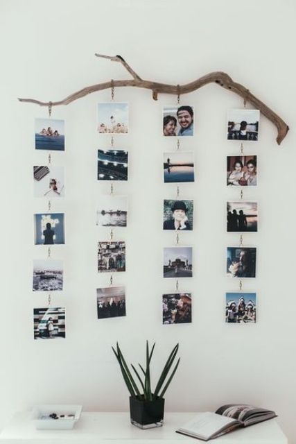 a tree branch with chains of photos hanging on it it's a cool photo holder that can be made in no time Dekorasi Bohemia, Video Backdrops, Farmhouse Side Table, Hemma Diy, Cute Dorm Rooms, 카페 인테리어 디자인, Room Transformation, Tv Stands, Cool Rooms