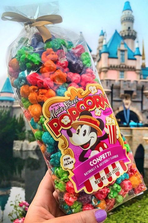 In Our Wildest Dreams, This Disney Popcorn Can Be Found at the End of Every Rainbow Confetti Popcorn, Disneyland Snacks, Disney Sweets, Disney Candy, Disney Desserts, Bebidas Do Starbucks, Disneyland Food, Disney Treats, Disney World Food